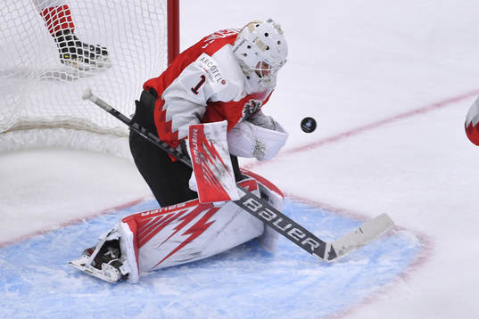 Sebastien Wraneshitz of Austria makes a first period save