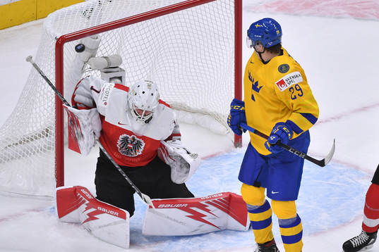 Albin Sundsvik of Sweden watches the puck enter the net
