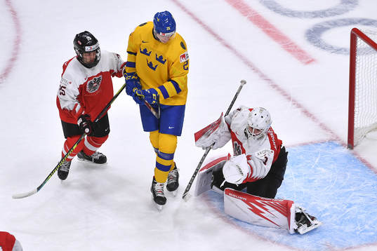 Sebastien Wraneshitz of Austria make a save with Elmer