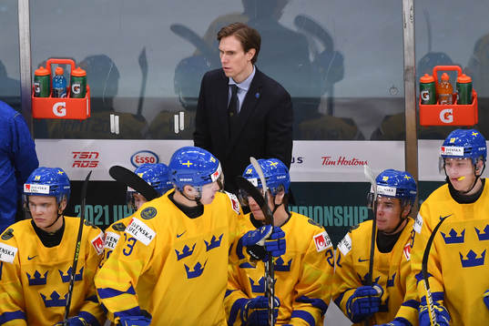 Team Sweden Head Coach Joel Rönnmark watches the play