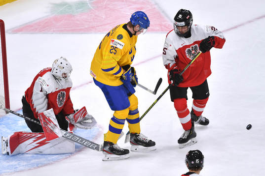 Sebastien Wraneshitz of Austria makes a third period save