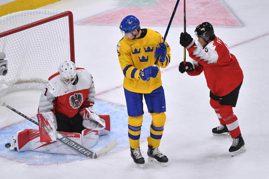 Sebastien Wraneshitz of Austria makes a third period save