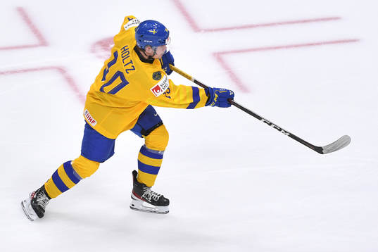 Alexander Holtz of Sweden shoots the puck