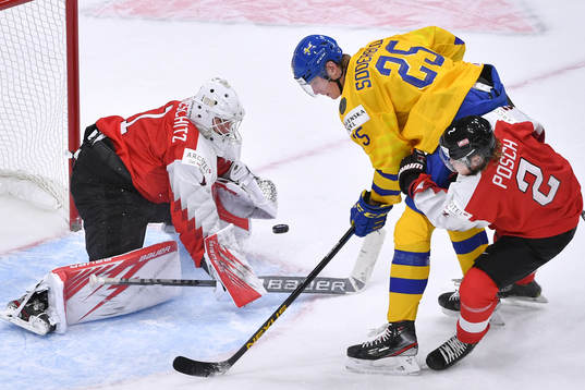 Sebastien Wraneshitz of Austria makes a save as Elmer