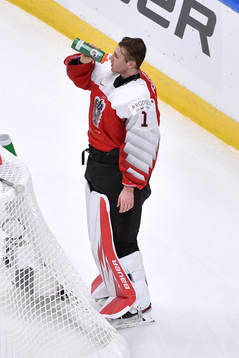 Sebastien Wraneshitz of Austria takes a water break