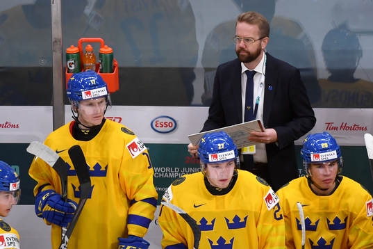 Sweden Team Manager Linus Hugosson watches the play