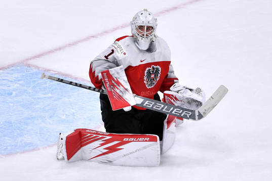 Sebastien Wraneshitz of Austria watches the puck go out of