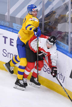 Oskar Kvist of Sweden collides