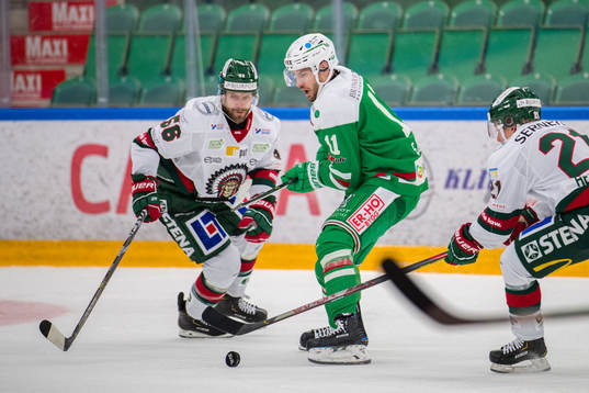 Rögles Mattias Sjögren och Frölundas Jonathan Sigalet