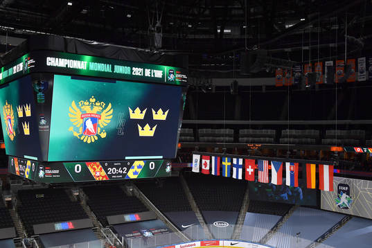 The score clock at Rogers Place displays both team's logos