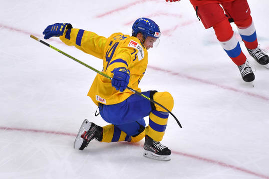 Arvid Costmar of Sweden celebrates his first period goal