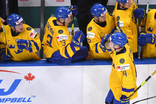 Arvid Costmar of Sweden celebrates his first period goal