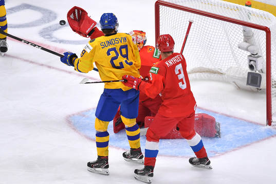 Albin Sundsvik of Sweden attempts to screen Yaroslav