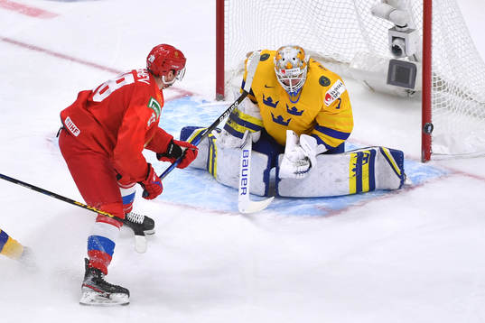 Jesper Wallstedt of Sweden makes a save against  Maxim