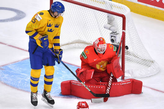Elmer Söderblom of Sweden makes a tip attempt as Yaroslav