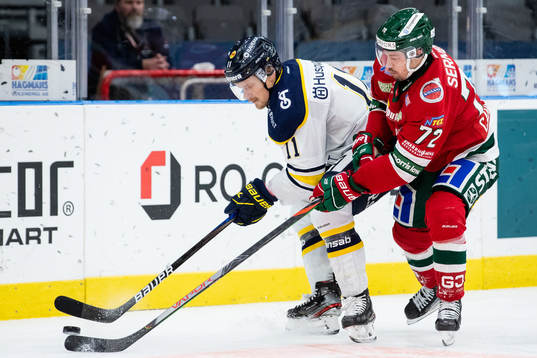 s Simon Önerud och Frölundas Patrik Carlsson