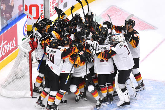Team Germany celebrates a 5-4 victory