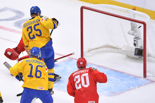 Elmer Söderblom watches the puck enter the net off a Noel
