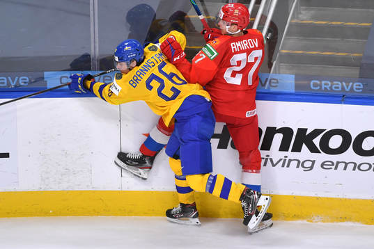 Alex Brännstam of Sweden checks Rodion Amirov of Russia