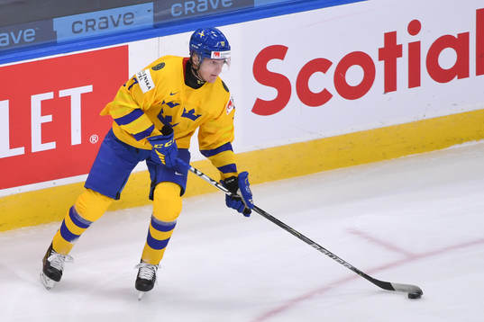 Oskar Kvist of Sweden prepares to make a pass