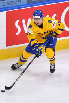 Lucas Raymond of Sweden skates with the puck