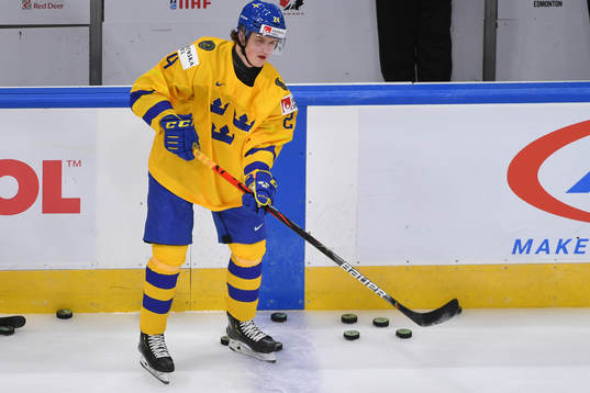 Oskar Olausson of Sweden makes a pass