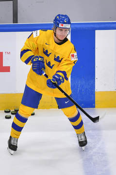 Emil Andrae of Sweden makes a pass