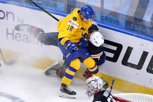 Lucas Raymond of Sweden and Tyler Kleven of USA collide