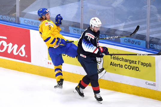 Brock Faber of USA and Philip Broberg of Sweden  collide
