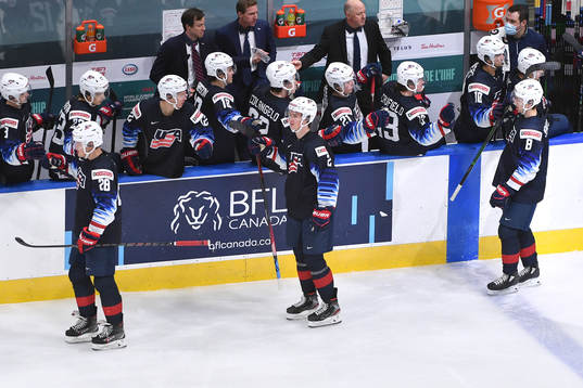 Arthur Kaliyev, Drew Helleson and Jake Sanderson of USA