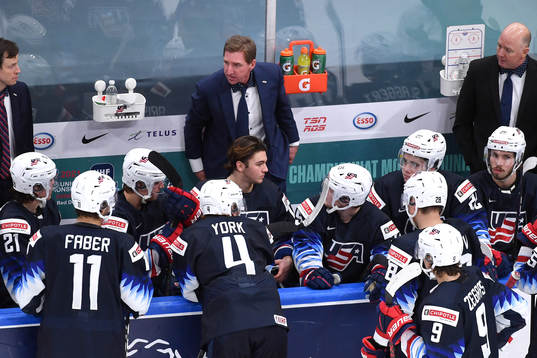 Team USA Head Coach Nate Leaman talks to his players