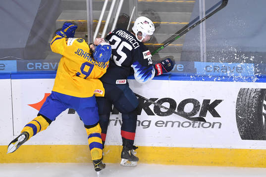 Albert Johansson of Sweden snaps his head back