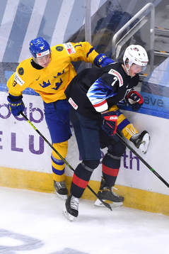 Emil Heineman of Sweden collides with Tyler Kleven of USA