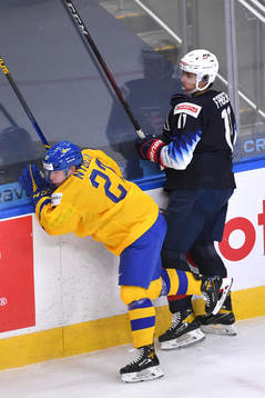Zion Nybeck of Sweden collides with Brock Faber of USA