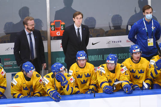 Team Sweden Head Coach Joel Rönnmark checks the time
