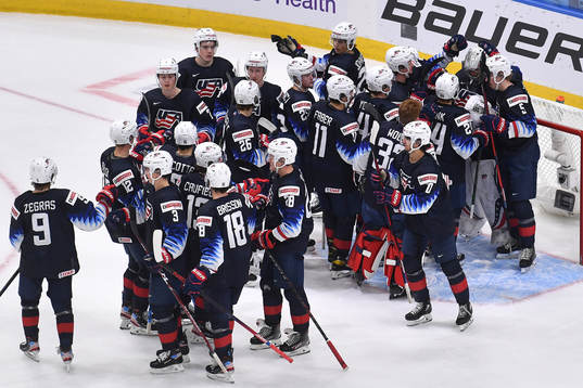 Team USA celebrates their 4-0 win