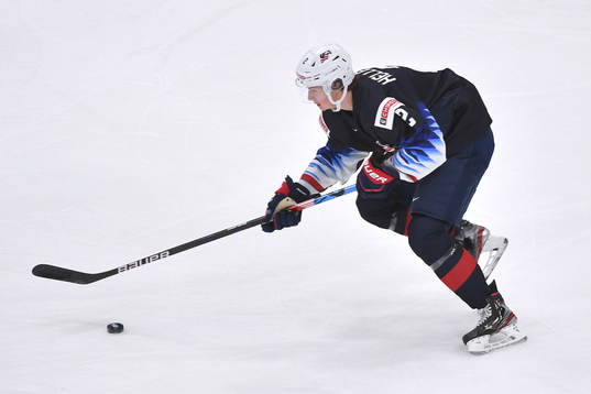 Drew Helleson of USA skates with the puck