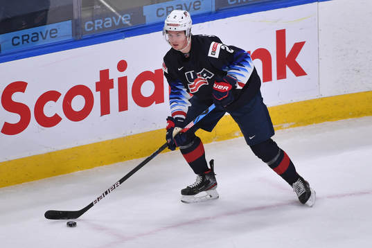 Drew Helleson of USA skates with the puck