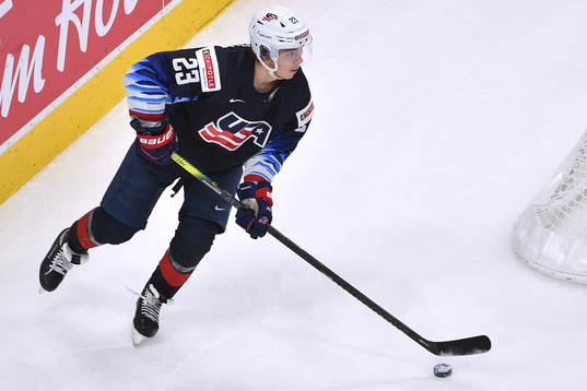 Ryan Johnson of USA skates with the puck
