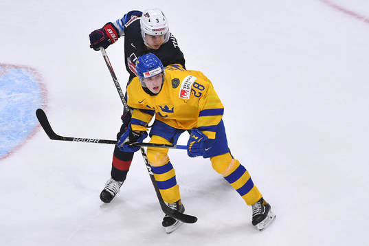 Noel Gunler of Sweden and Henry Thrun of USA battle for