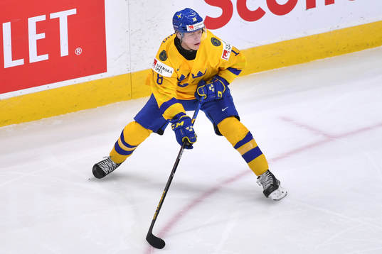 Lucas Raymond of Sweden skates with the puck