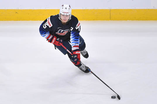 Alex Turcotte of USA skates with the puck