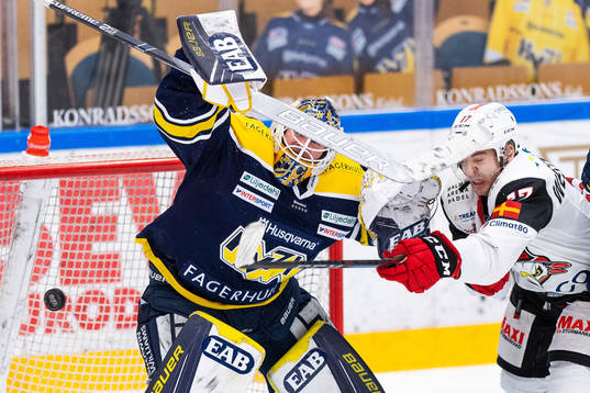 s målvakt Jonas Gunnarsson och Malmö Redhawks Pathrik