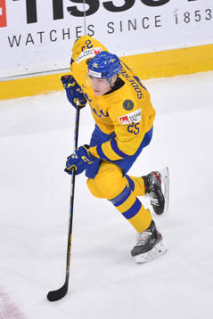 Elmer Söderblom of Sweden skates with the puck