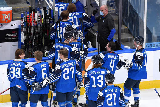 Team Finland leaves the ice