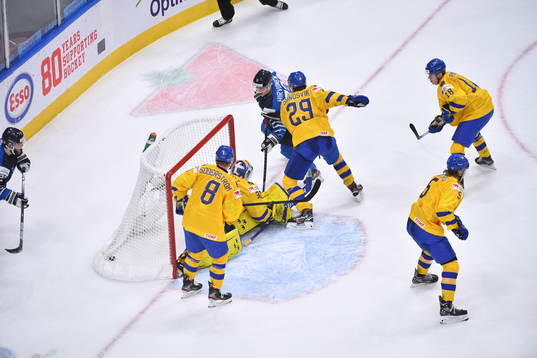 Roni Hirvonen of Finland scores the game winning goal