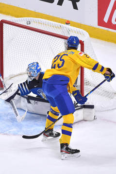 Elmer Söderblom of Sweden scores