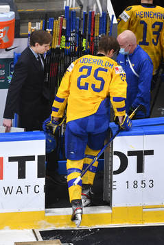 Elmer Söderblom of Sweden leaves the ice in disappointment