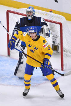 Albin Sundsvik of Sweden screens Kari Piiroinen of Finland