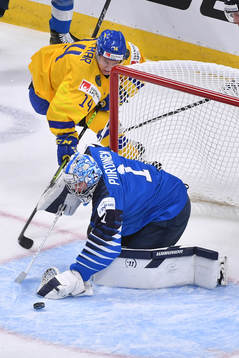 Kari Piiroinen of Finland makes a save
